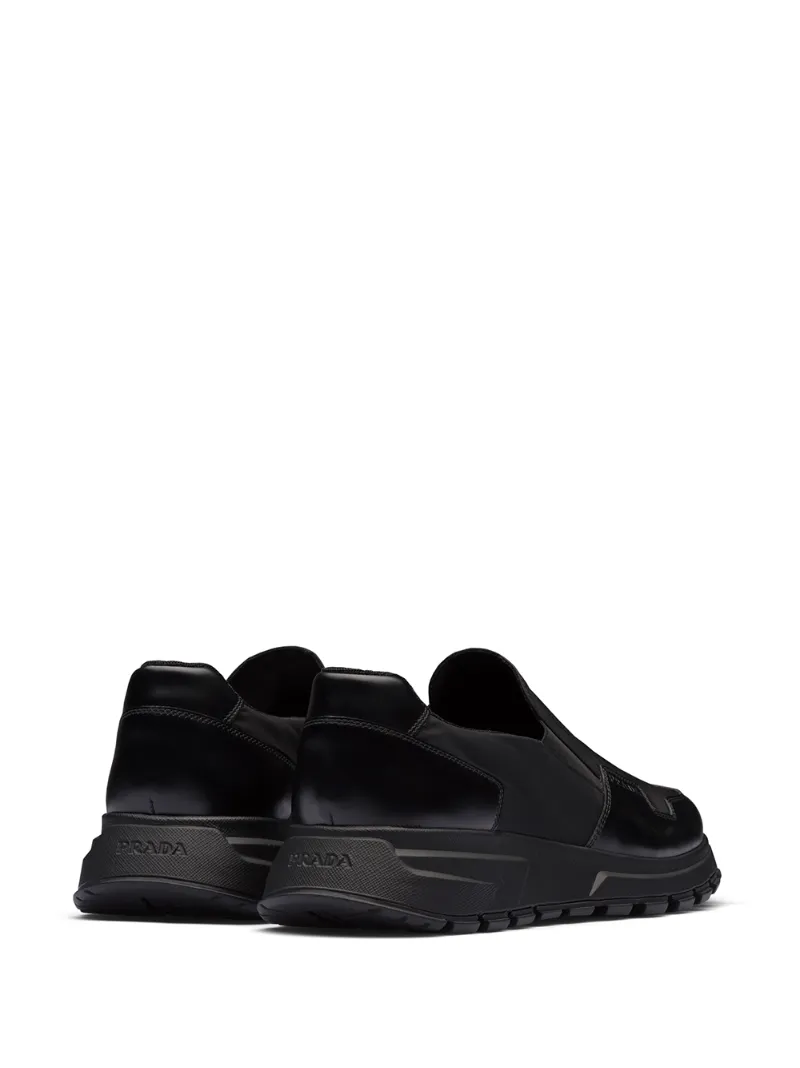 PRADA LEATHER PANEL SLIP-ON SNEAKERS