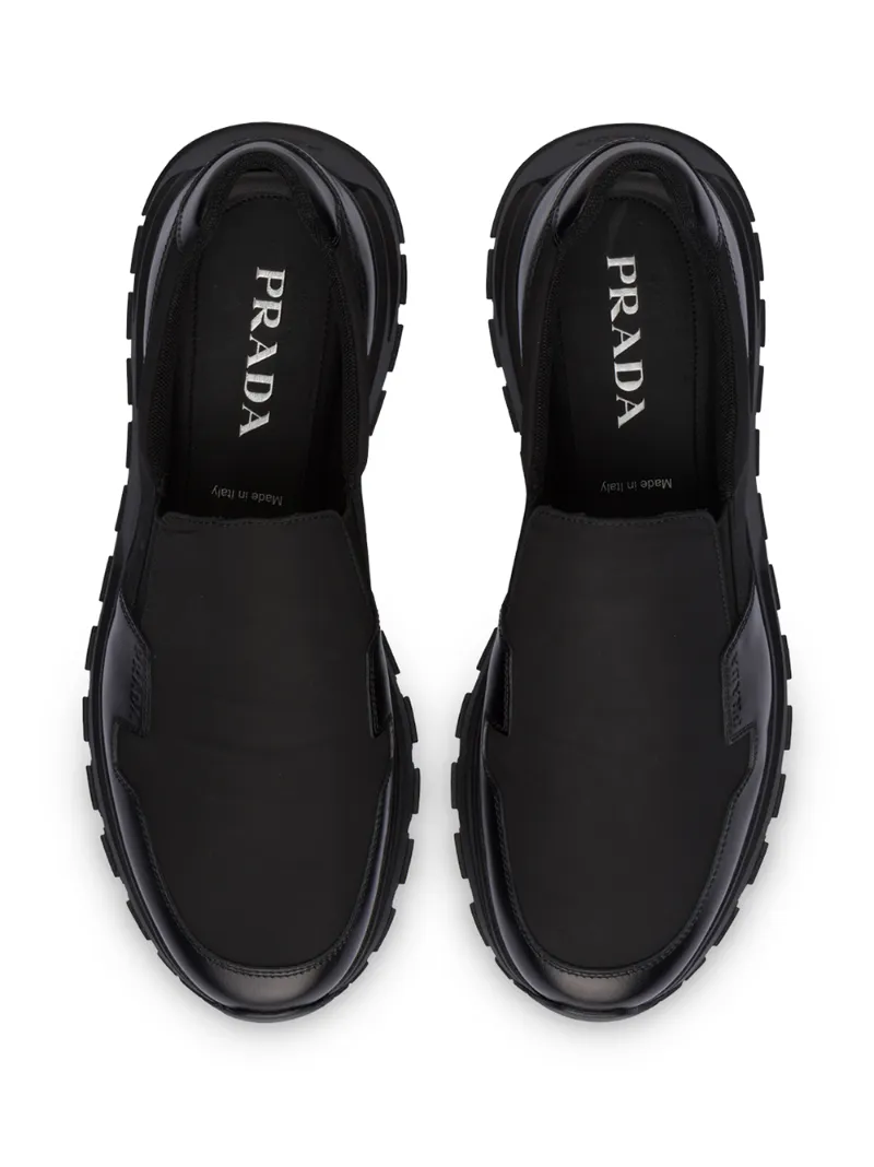 PRADA LEATHER PANEL SLIP-ON SNEAKERS