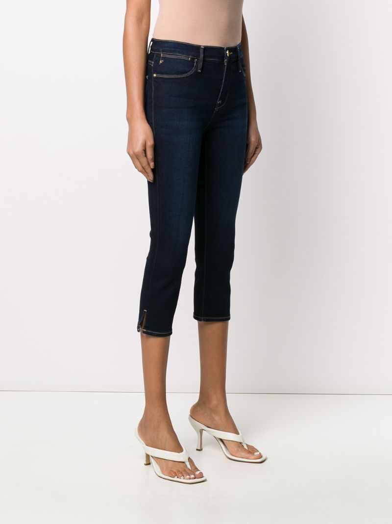 Shop Frame Mid Rise Cropped Jeans In Blue