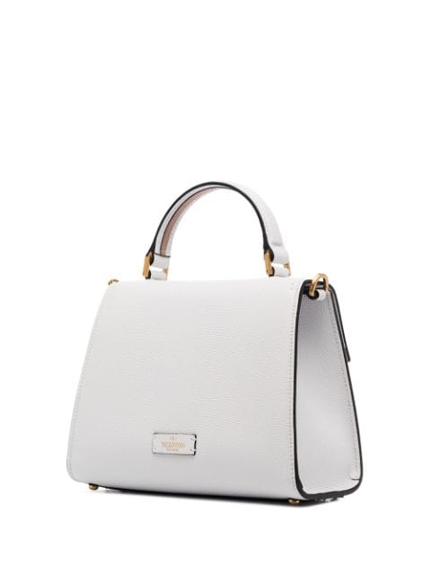 Shop white Valentino Garavani small VSLING top-handle bag with Express ...