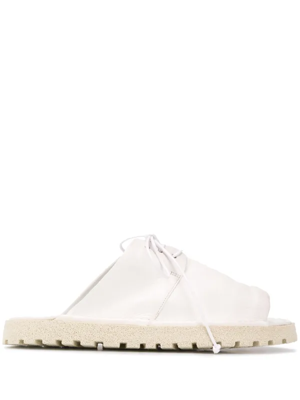 white slip on sandals