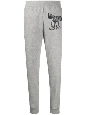 logo track pants by Moschino, available on farfetch.com for $284 Mila Kunis Pants SIMILAR PRODUCT