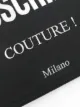 Moschino logo-print clutch bag