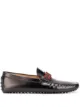 الصورة 1 من Tod's حذاء سهل الارتداء ببروش الشعار