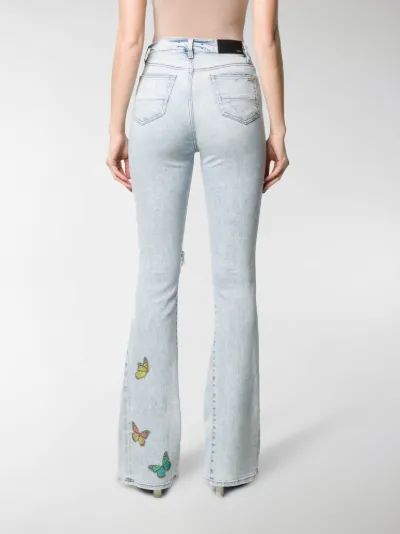 AMIRI butterfly-print ripped jeans blue 