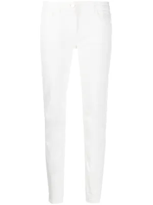 low-rise slim-fit jeans by be blumarine, available on farfetch.com for $172 Kendall Jenner Pants SIMILAR PRODUCT