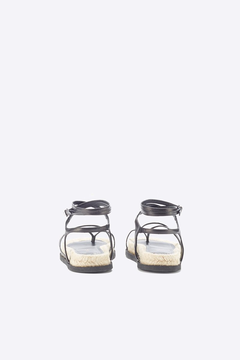 Yasmine Strappy Espadrille Sandal-black #0 Yasmine Strappy Espadrille Sandal, Black calf leather Yasmine strappy espadrille sandals from 3.1 PHILLIP LIM featuring open toe, crossover strap detail, buckle-fastening ankle strap, branded insole and flat sole.- 2