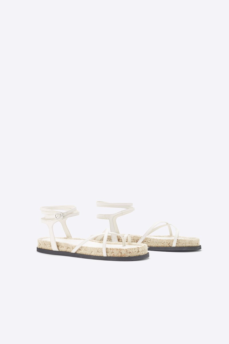 Yasmine Strappy Espadrille Sandal-white #1 Yasmine Strappy Espadrille Sandal, White calf leather Yasmine strappy espadrille sandals from 3.1 PHILLIP LIM featuring open toe, crossover strap detail, buckle-fastening ankle strap, branded insole and flat sole.- 1