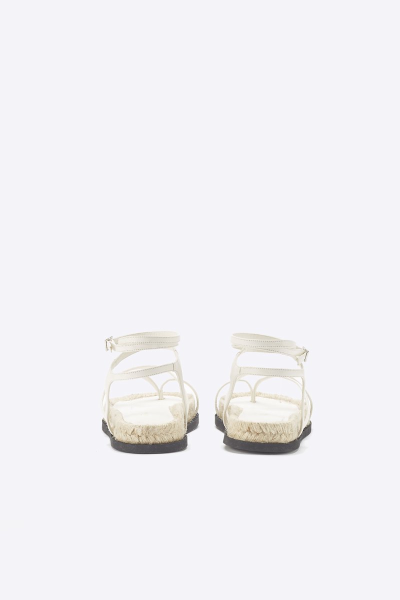 Yasmine Strappy Espadrille Sandal-white #0 Yasmine Strappy Espadrille Sandal, White calf leather Yasmine strappy espadrille sandals from 3.1 PHILLIP LIM featuring open toe, crossover strap detail, buckle-fastening ankle strap, branded insole and flat sole.- 4