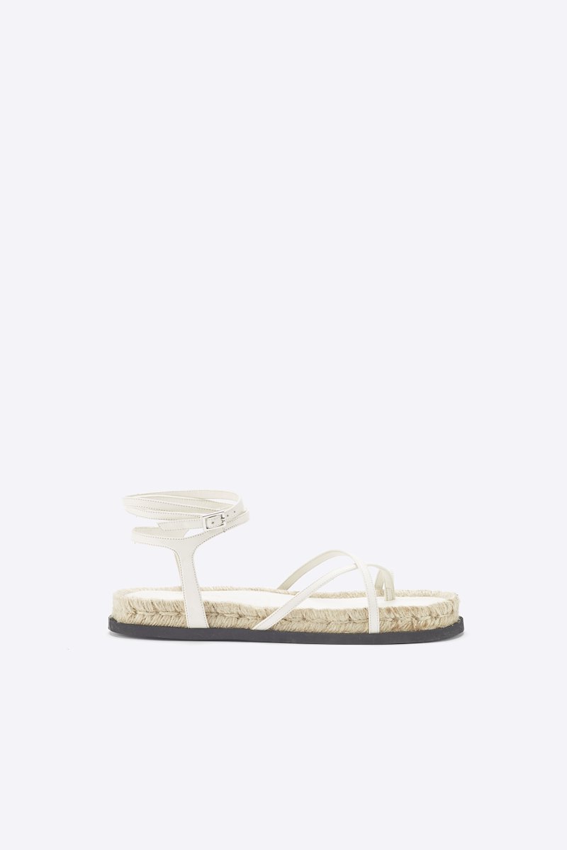 Yasmine Strappy Espadrille Sandal-white #0 Yasmine Strappy Espadrille Sandal, White calf leather Yasmine strappy espadrille sandals from 3.1 PHILLIP LIM featuring open toe, crossover strap detail, buckle-fastening ankle strap, branded insole and flat sole.- 0