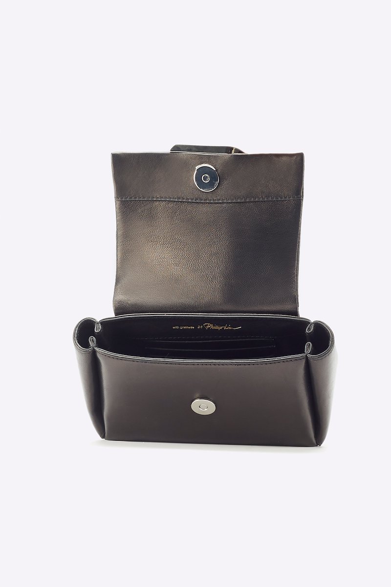 Alix Nano Soft Chain Bag-black #1 Alix Nano Soft Chain Bag, Black calf leather Alix chain crossbody bag from 3.1 PHILLIP LIM featuring foldover top with magnetic fastening, internal card slots, chain-link shoulder strap and logo plaque.- 3