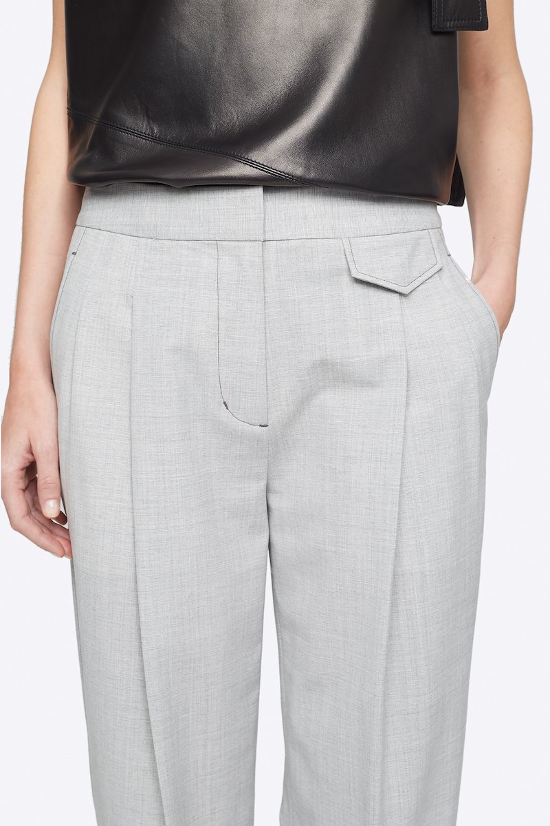 Wool Chambray Wide Leg Trouser-grey #1 Wool Chambray Wide Leg Trouser, Ash grey wool-blend chambray wide-leg tailored trousers from 3.1 PHILLIP LIM featuring high waist, concealed front fastening, two diagonal pockets to the sides, front flap pocket, rear button-fastening pocket and loose fit. POSITIVELY CONSCIOUS: This product is made with a material widely recognised as being better for the planet, so you can be confident you are choosing positively .- 3