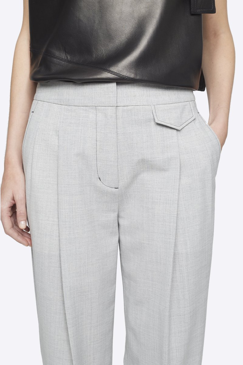 Wool Chambray Wide Leg Trouser-grey #1 Wool Chambray Wide Leg Trouser, Ash grey wool-blend chambray wide-leg tailored trousers from 3.1 PHILLIP LIM featuring high waist, concealed front fastening, two diagonal pockets to the sides, front flap pocket, rear button-fastening pocket and loose fit. POSITIVELY CONSCIOUS: This product is made with a material widely recognised as being better for the planet, so you can be confident you are choosing positively .- 5