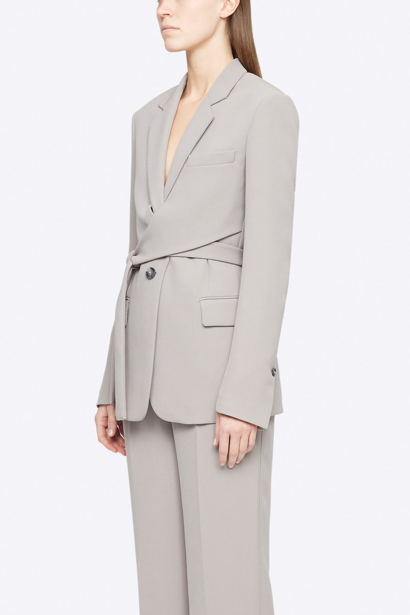 Heavy Cady Wrap Blazer-grey #1 Heavy Cady Wrap Blazer, Grey single-breasted wrap blazer from 3.1 PHILLIP LIM featuring notched lapels, front button fastening, long sleeves, jetted chest pocket, side tie fastening, central rear vent and two front flap pockets. POSITIVELY CONSCIOUS: This product is made with a material widely recognised as being better for the planet, so you can be confident you are choosing positively .- 1