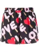 Image 1 of Love Moschino logo print shorts