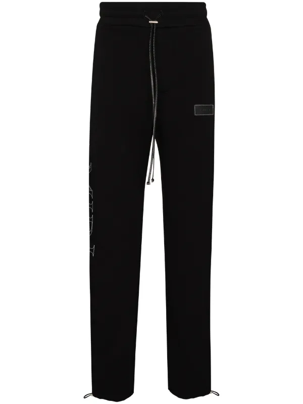 amiri track pants