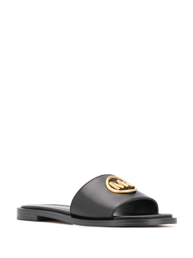 Shop Michael Michael Kors Logo Plaque Flat Mules In Black