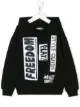 الصورة 1 من Jeremy Scott Junior هودي مخيوطة بشارة