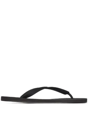 white designer flip flops