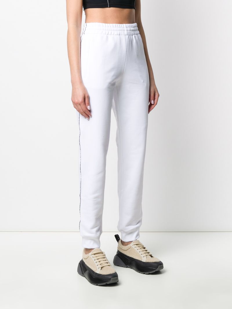 Shop Moschino Logo-tape Track Pants In White