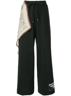 scarf-panelled sweatpants by Maison Mihara Yasuhiro, available on farfetch.com for £495 Shay Mitchell Pants SIMILAR PRODUCT