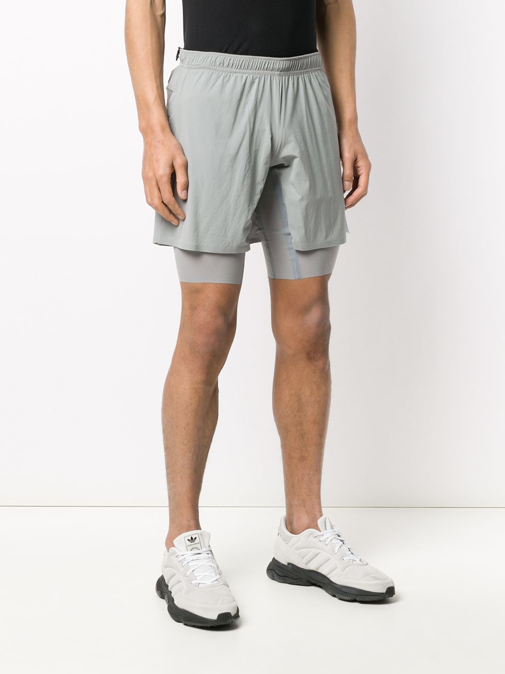 фото Satisfy deconstructed layered running shorts