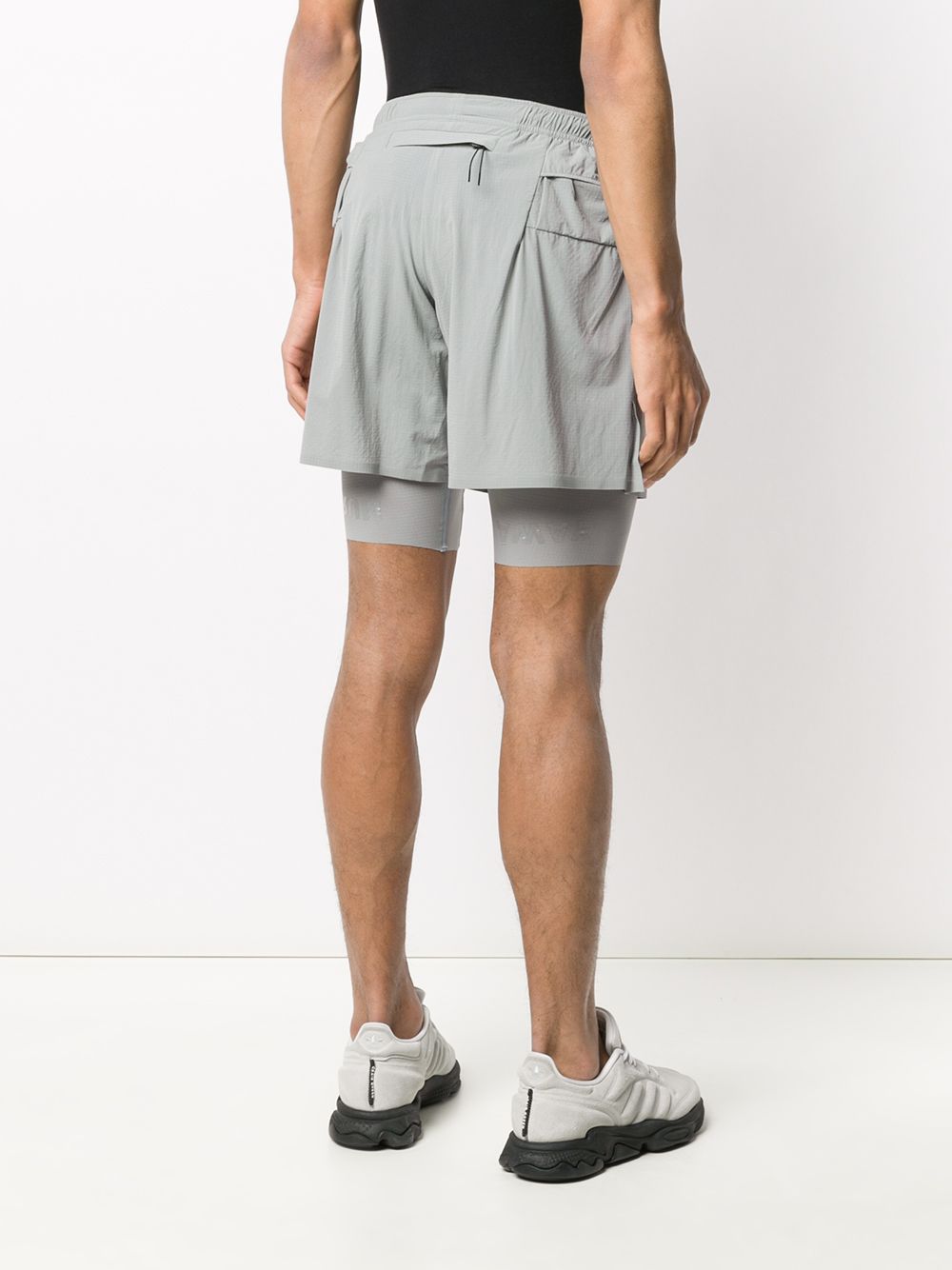 фото Satisfy deconstructed layered running shorts