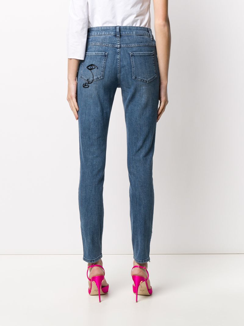 Shop Moschino Cornely Embroidery Skinny Jeans In Blue