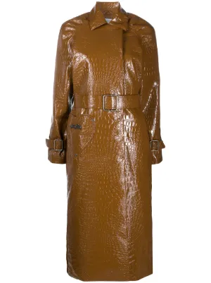 patent trench coat by Saks Potts, available on farfetch.com for $387 Kylie Jenner Outerwear SIMILAR PRODUCT