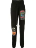 Haculla movie poster print track trousers - Black