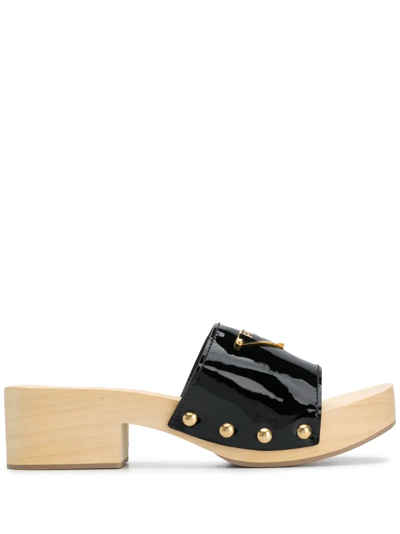 Prada Logo Plaque Mules In Black