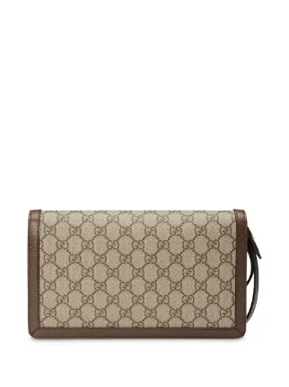 gucci supreme clutch