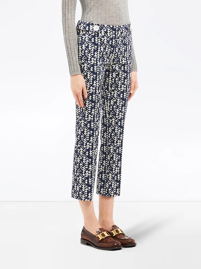 Shop Prada Graphic Print Cropped Trousers In Blue