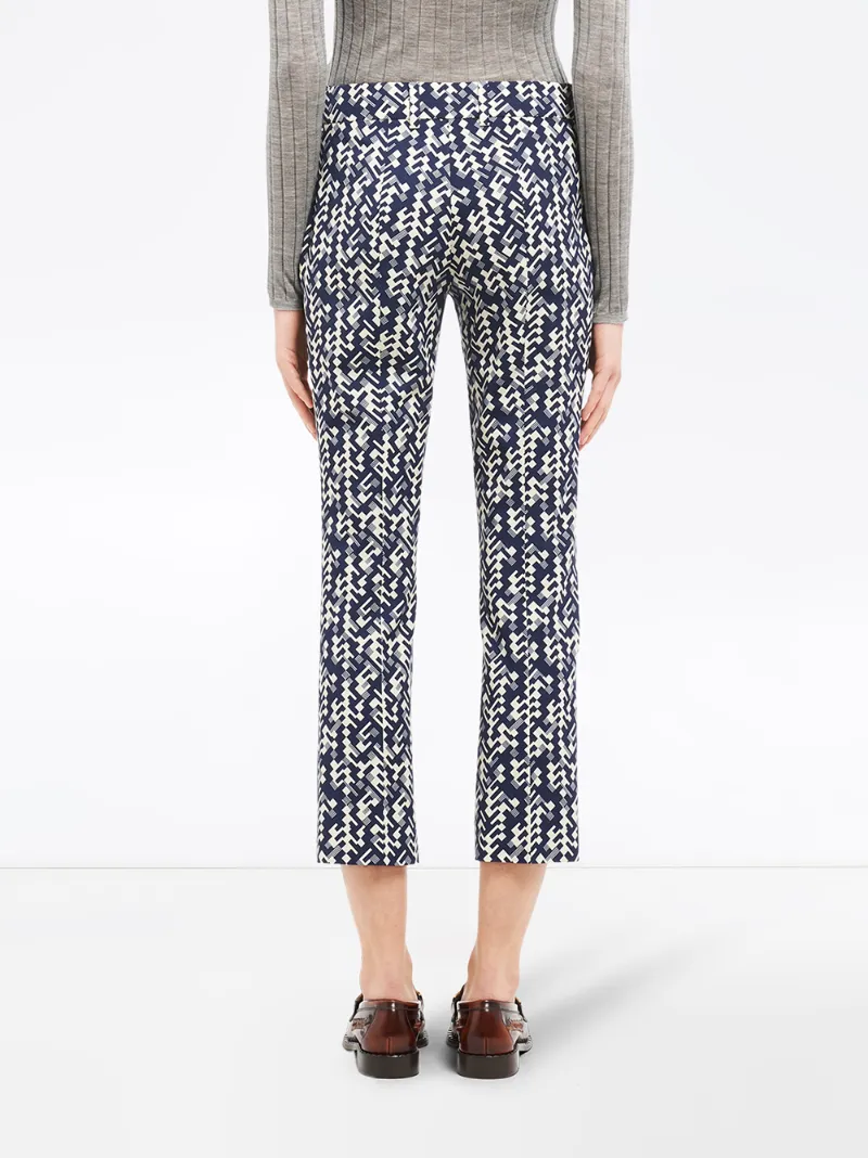 Shop Prada Graphic Print Cropped Trousers In Blue