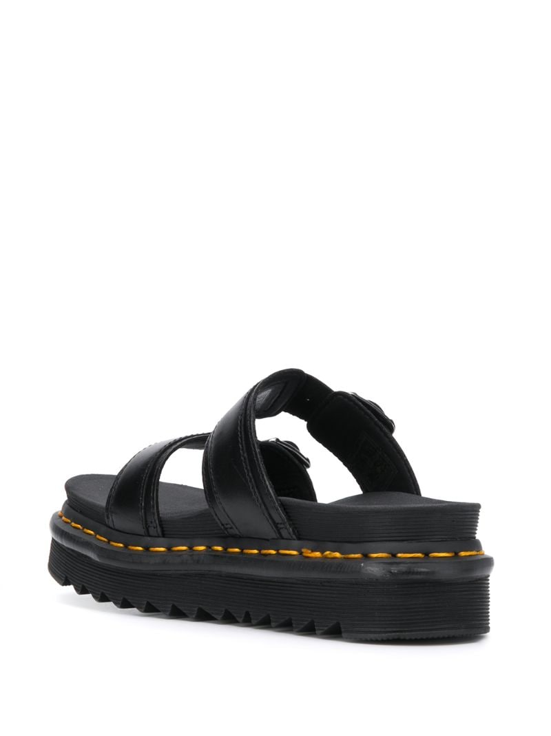 Shop Dr. Martens' Buckled Ridged Sole Sandals In Black