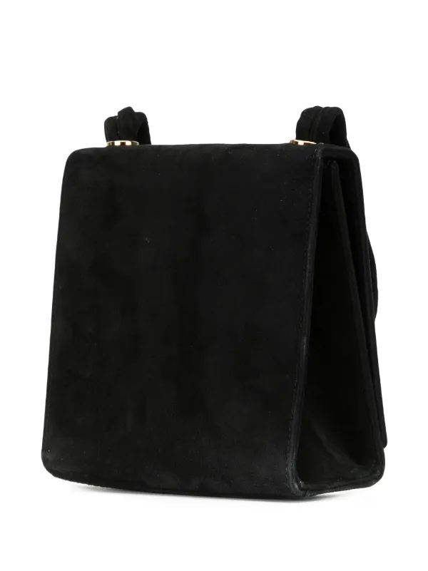 black suede turning white