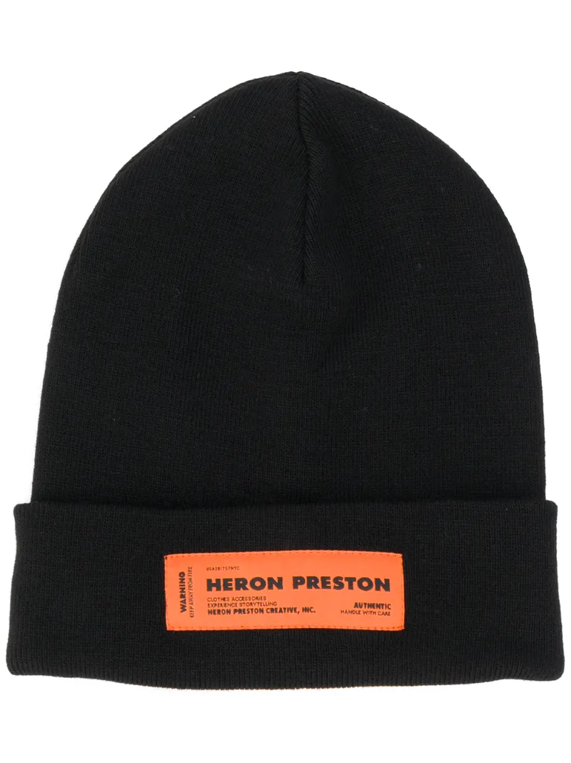 Click to view more detailed imagery on our partner's website Heron Preston Logo Label Knitted Beanie In Black