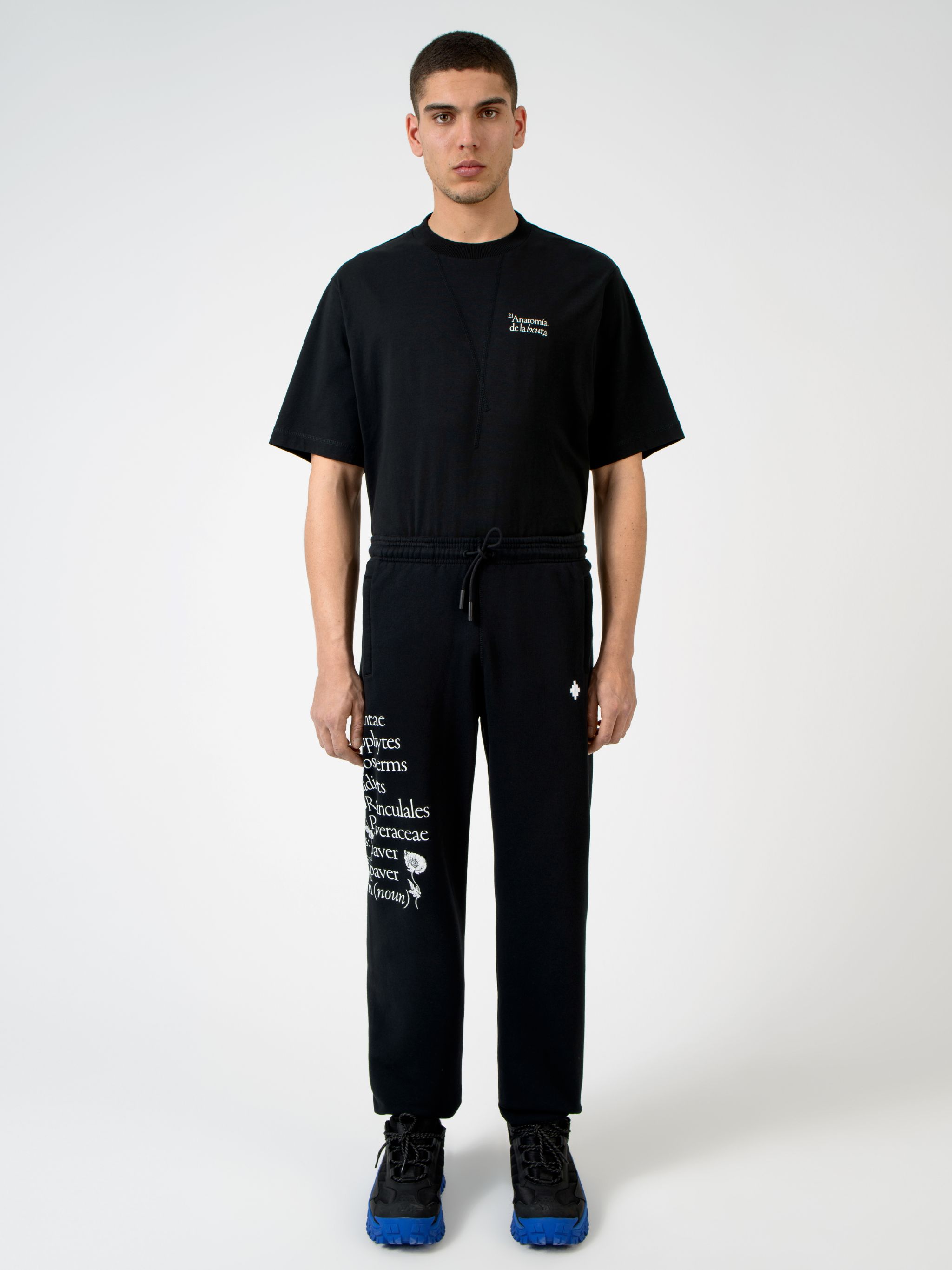 black cotton embroidered logo to the front slogan print elasticated ankles elasticated waistband drawstring fastening tapered design two side slit pockets rear welt pocket