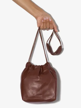 brown drawstring soft leather cross body bag展示图