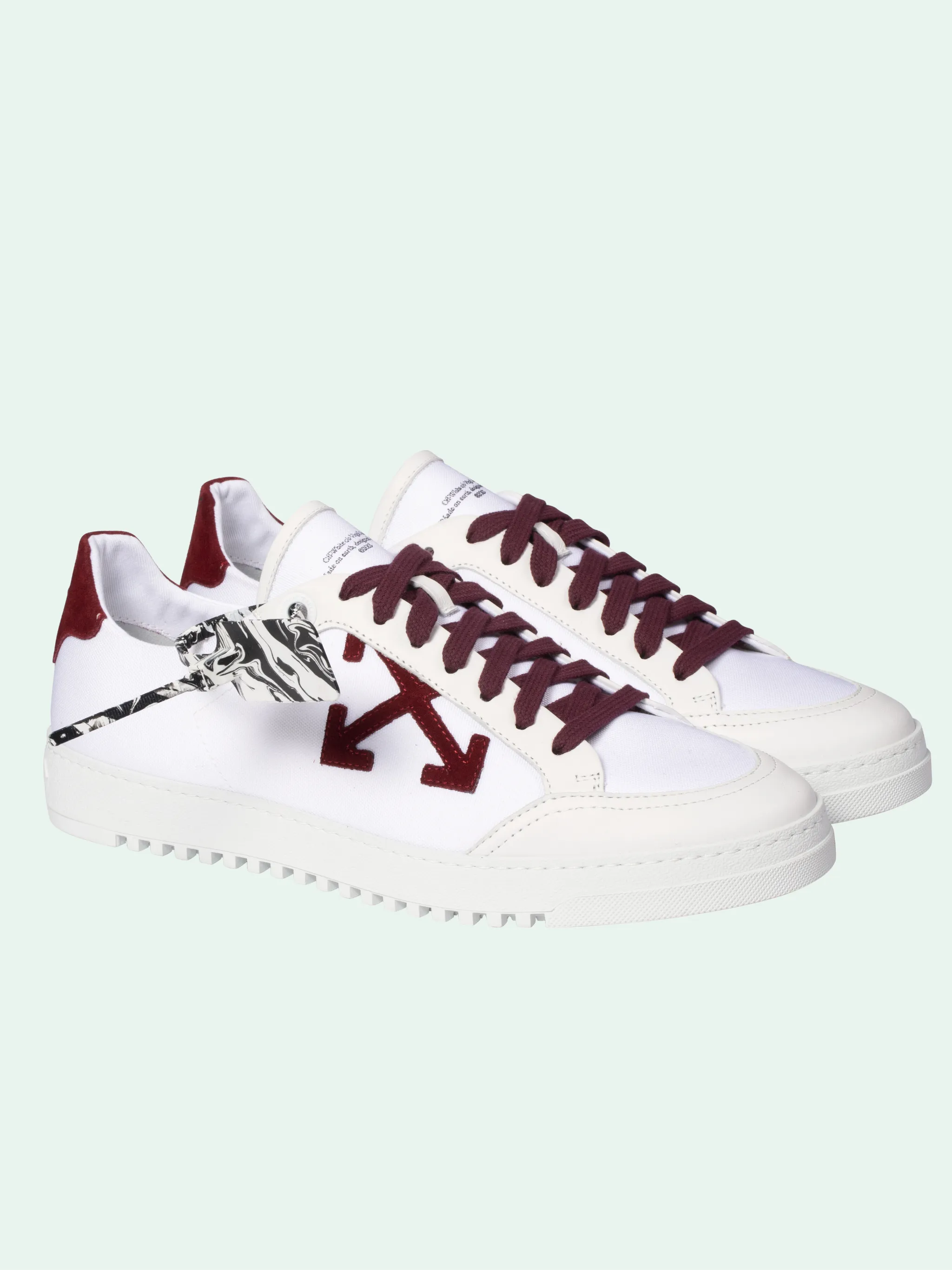 white and burgundy sneakers