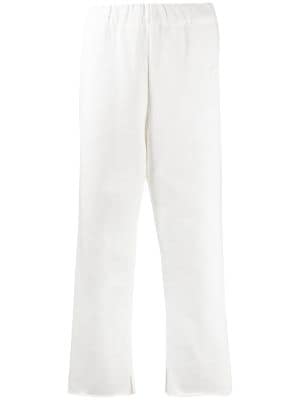 white cut off trousers