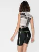 Danielle Guizio cropped newspaper-print top