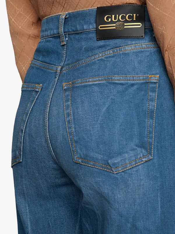 gucci logo jeans