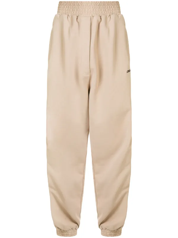 beige track pants