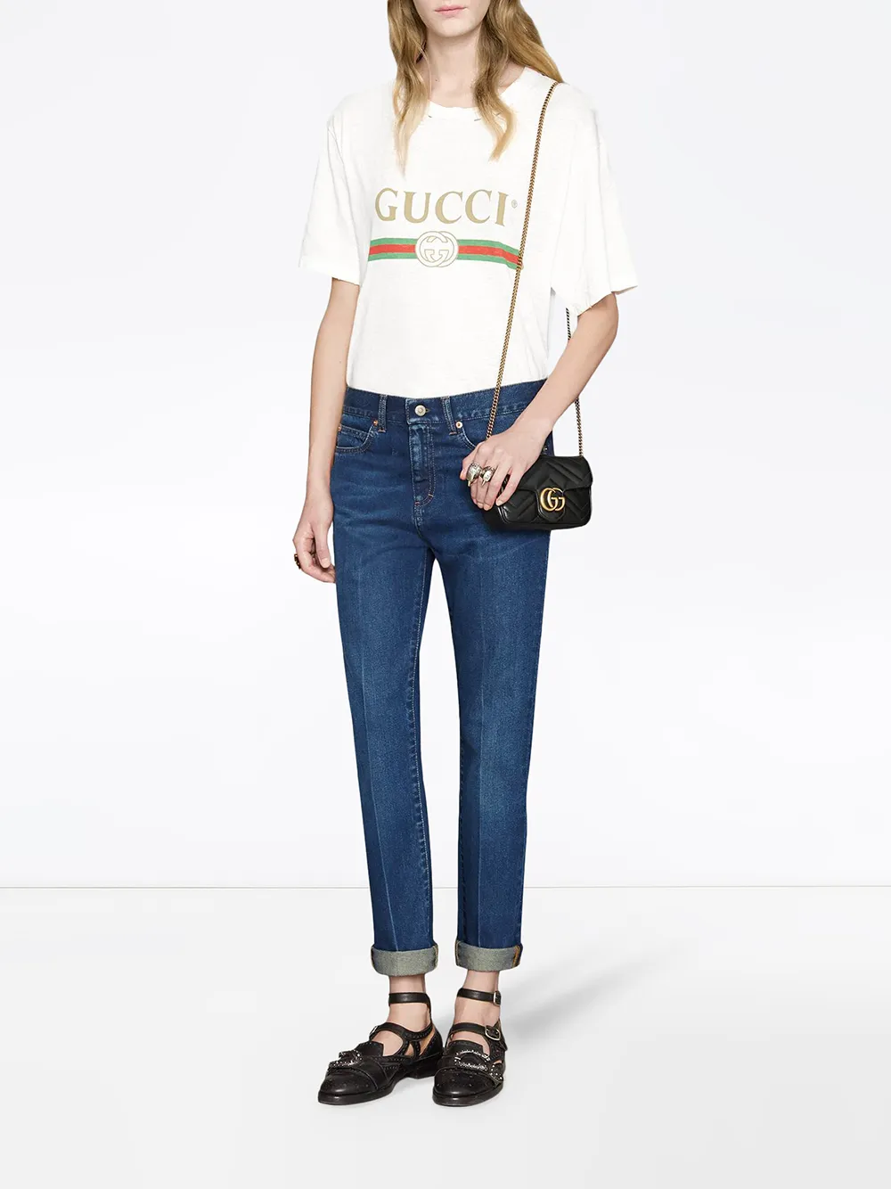 Shop black Gucci GG Marmont matelassé 