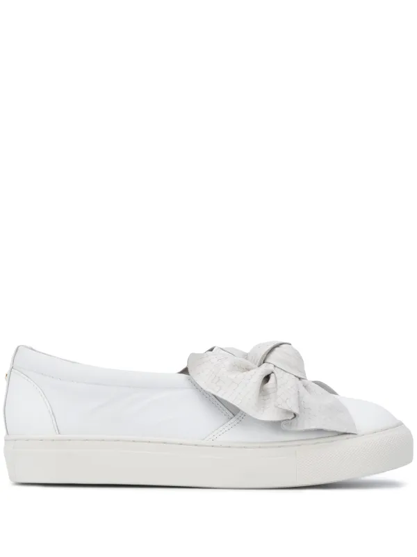 white sneakers with bow