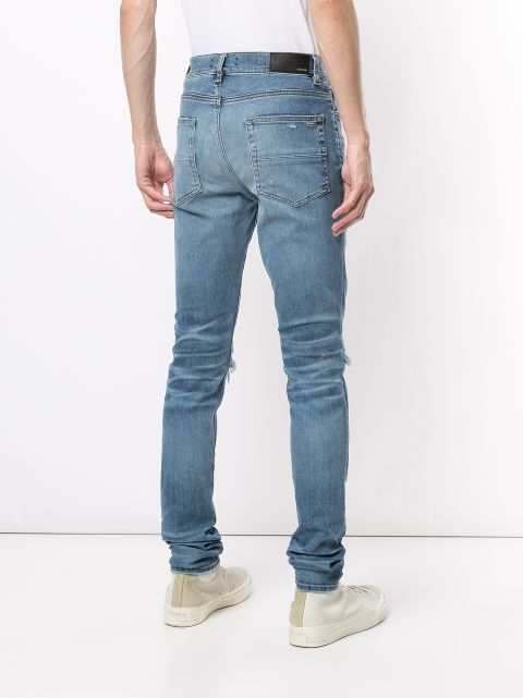 amiri mx1 distressed skinny jeans