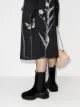 Maison Margiela بوت عسكري بتصميم ريترو