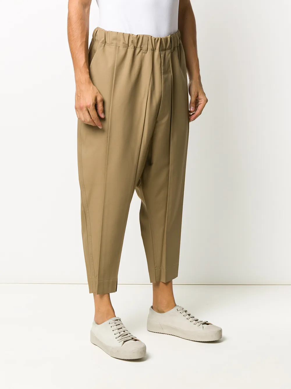 фото Issey miyake men loose-fit pleated tapered trousers