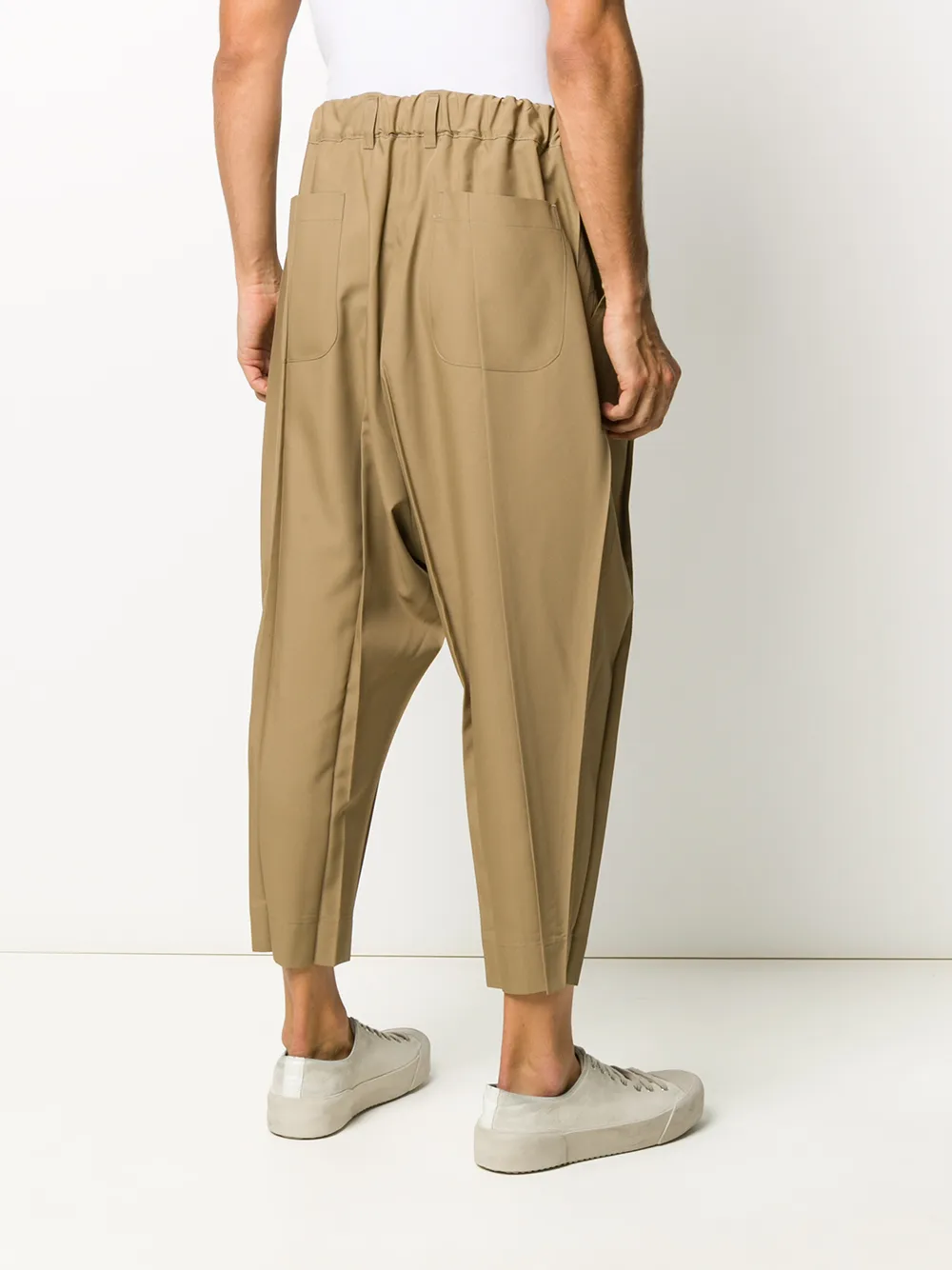 фото Issey miyake men loose-fit pleated tapered trousers